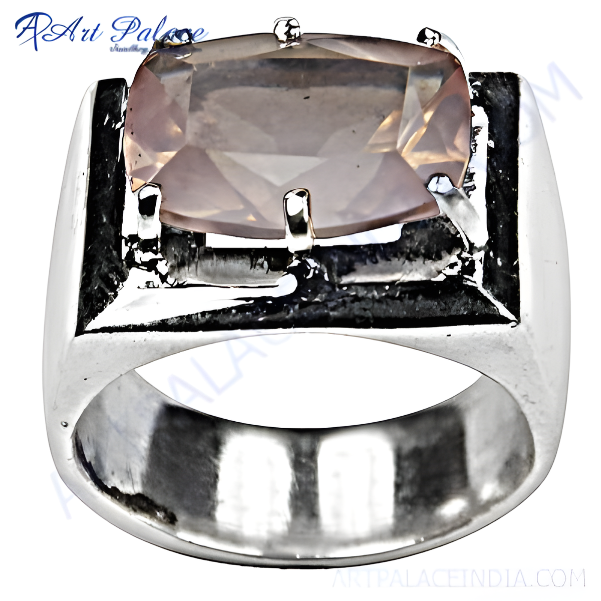Sterling silver ring with a large, faceted rose quartz gemstone in a square setting, perfect for men