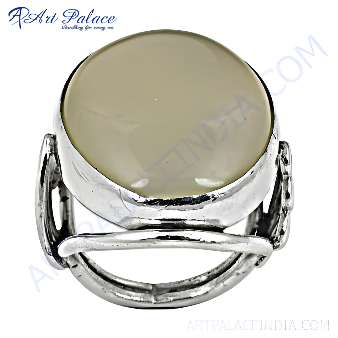 Sterling silver statement ring featuring a large, oval beige gemstone, perfect for women.
