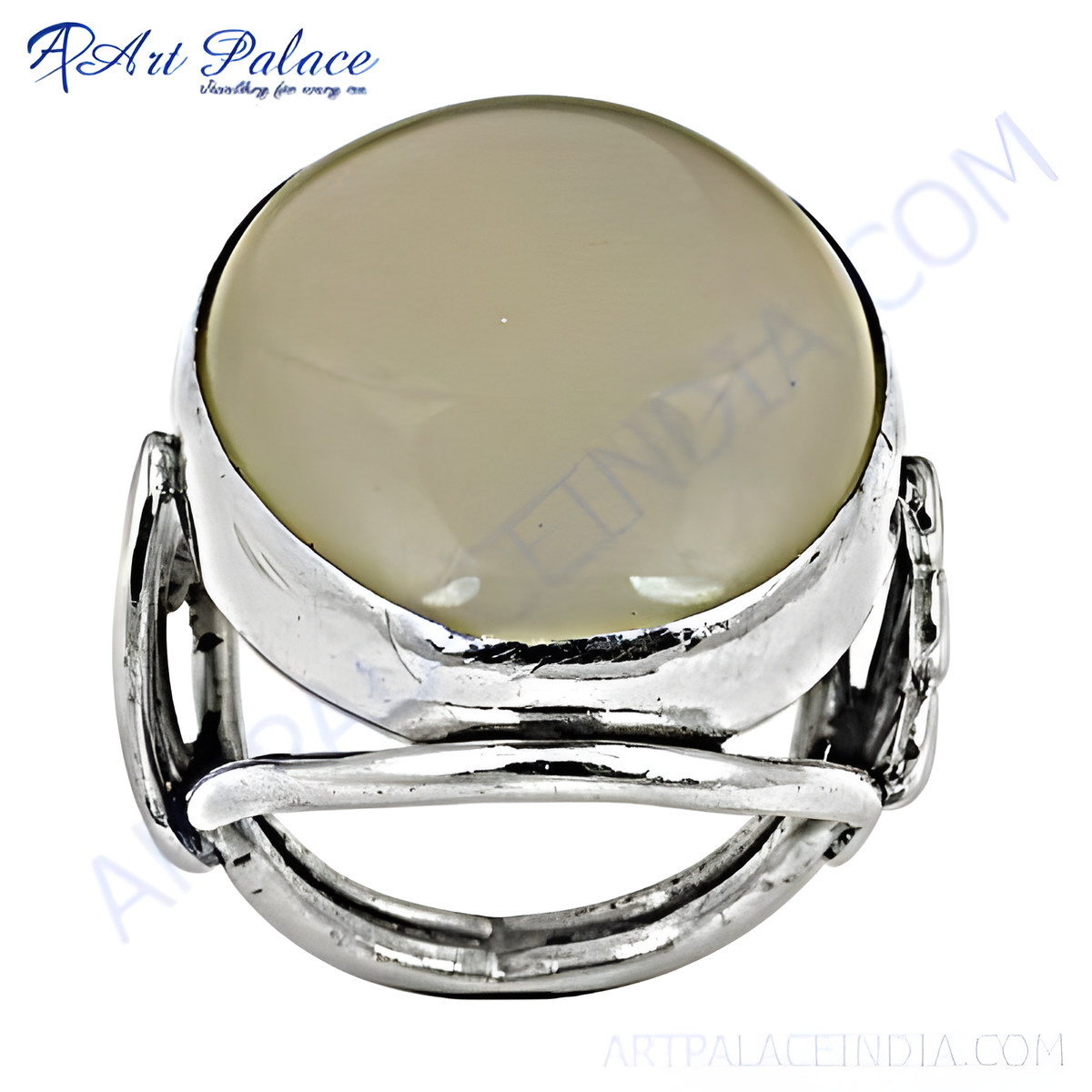 Sterling silver statement ring featuring a large, oval beige gemstone, perfect for women
