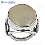 Load image into Gallery viewer, Sterling silver statement ring featuring a large, oval beige gemstone, perfect for women.
