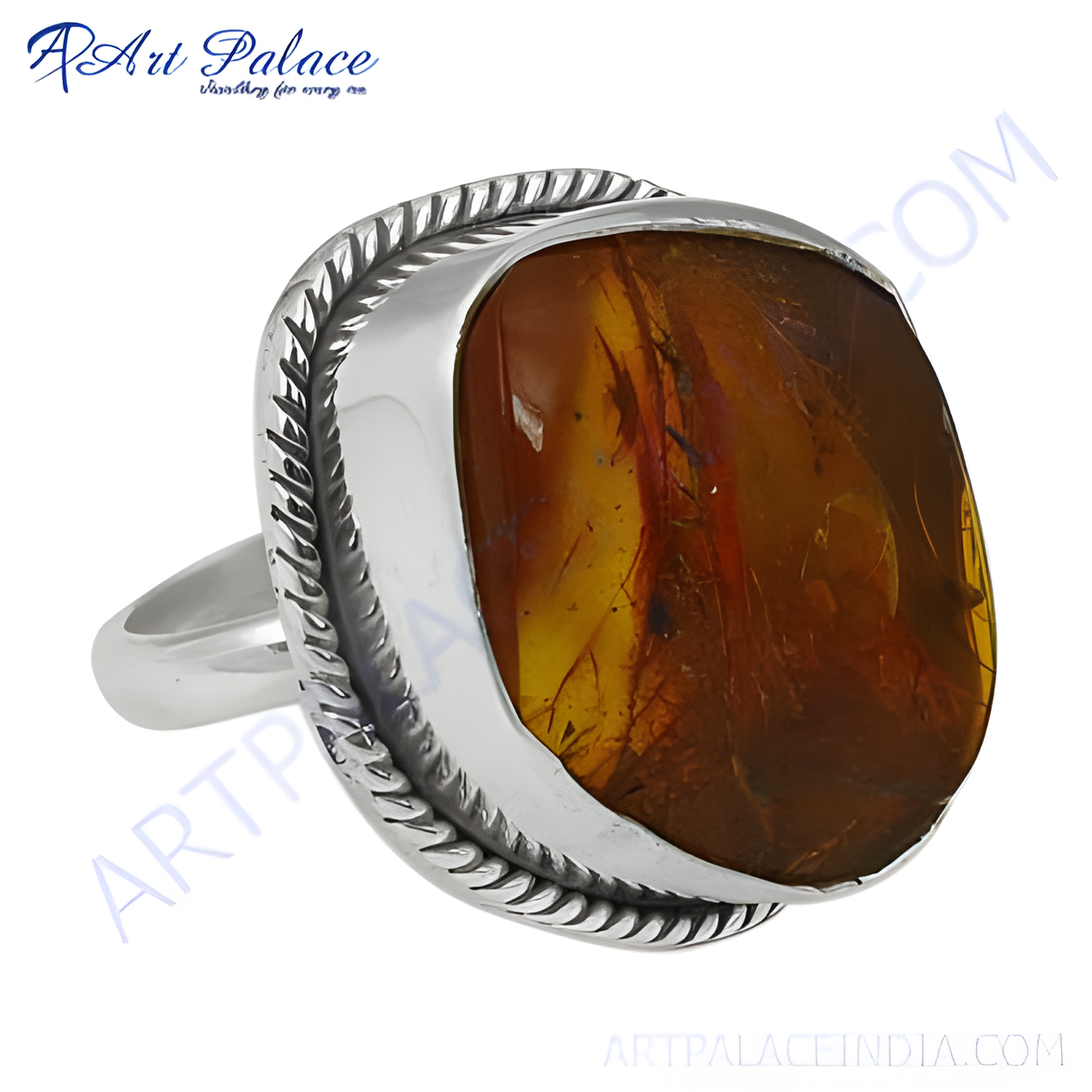 Sterling silver ring with a large amber gemstone in a statement setting