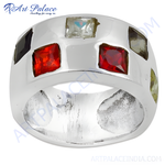 Load image into Gallery viewer, Silver ring with multiple square-cut gemstones in various colors, a statement piece of jewelry.
