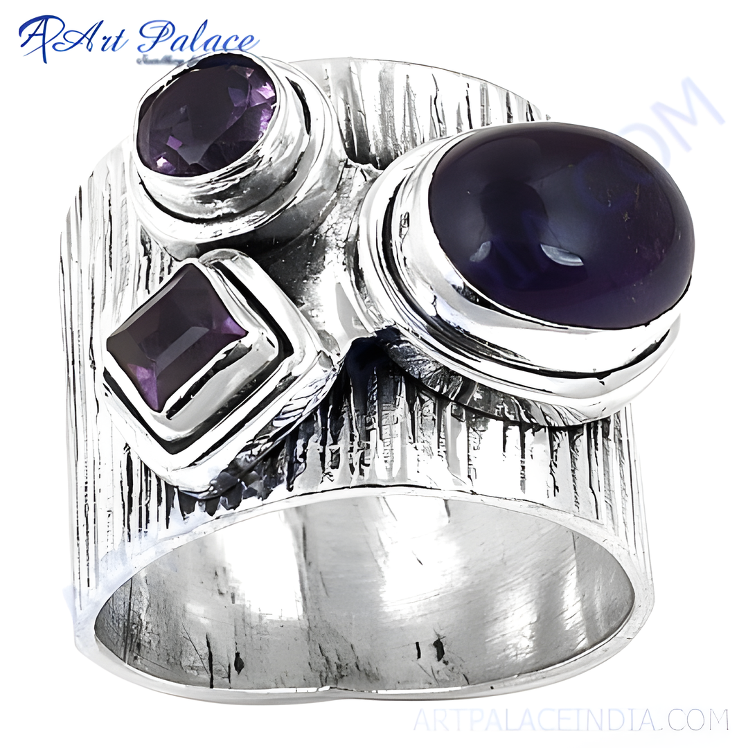 Sterling silver ring with amethyst gemstones. Features oval and square-cut amethyst stones.