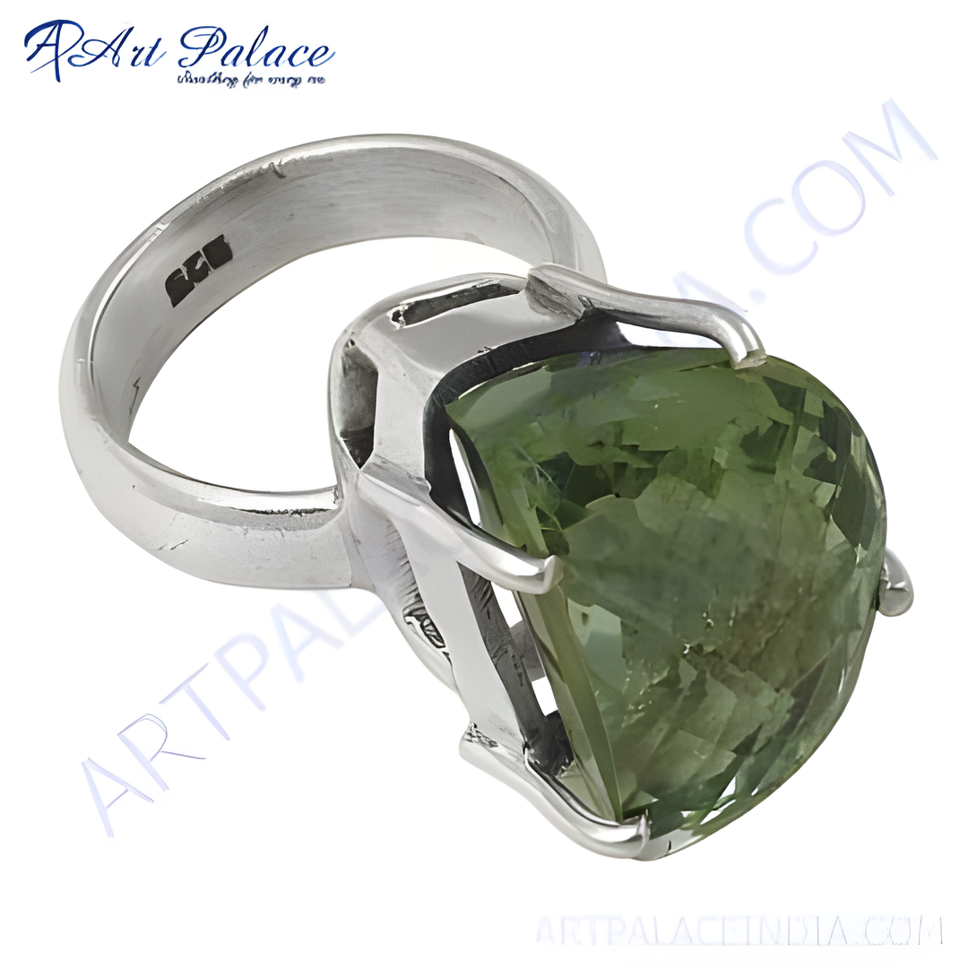 Sterling silver ring with a large green amethyst gemstone, faceted cut.