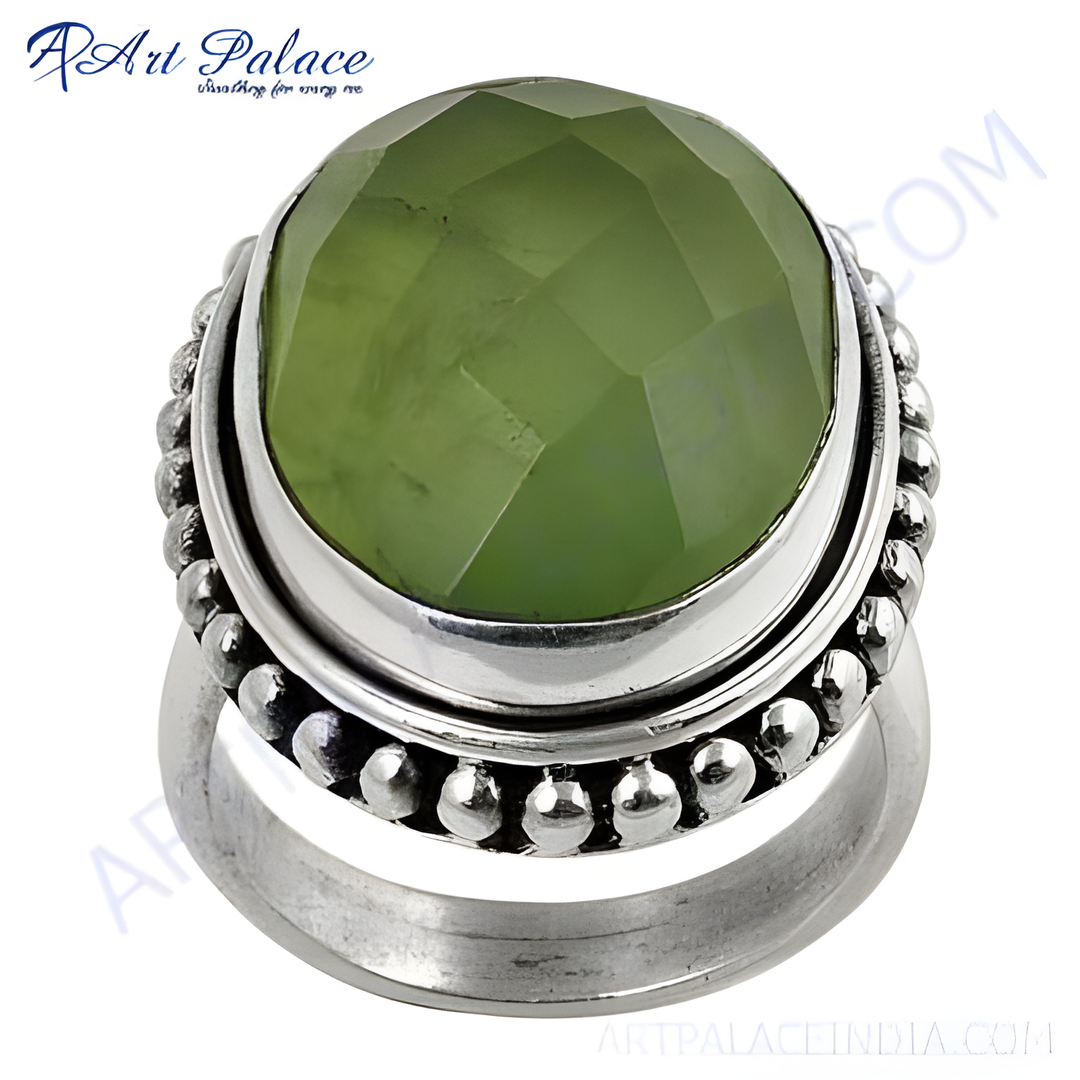 Sterling silver ring with a large faceted green quartz gemstone, elegant and stylish design.