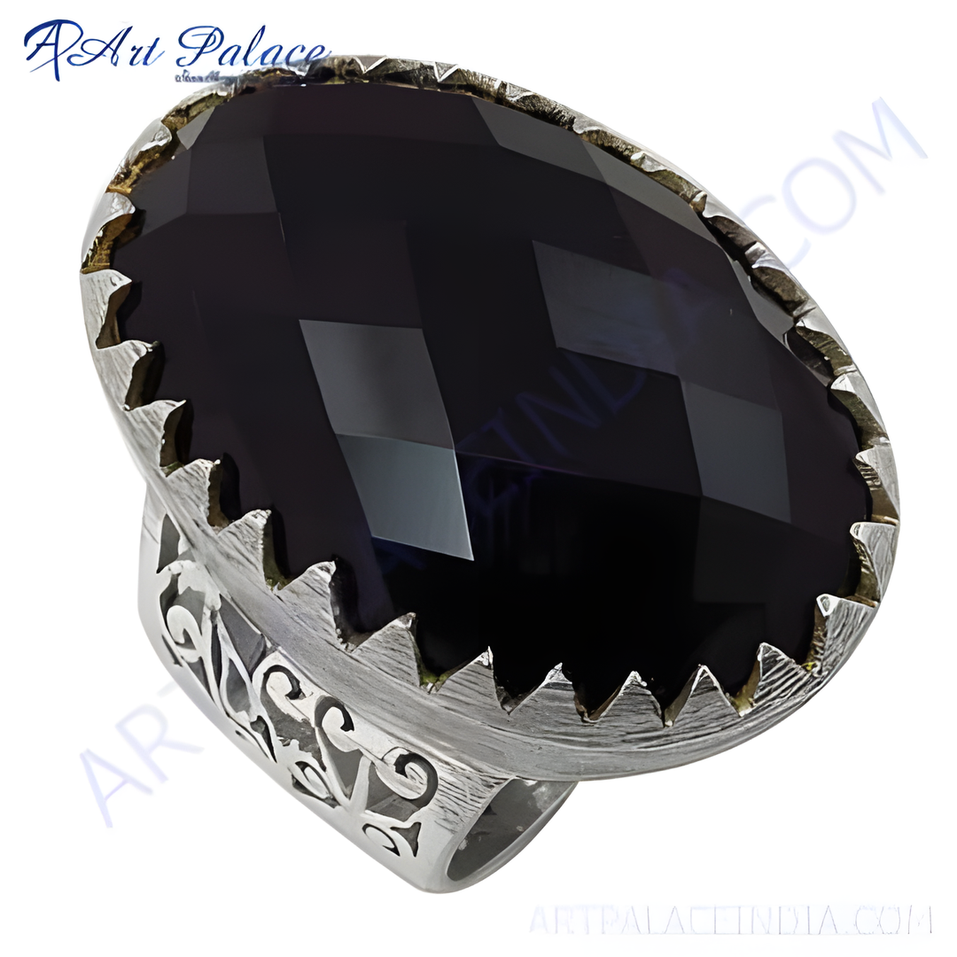925 sterling silver statement ring with a large black gemstone.