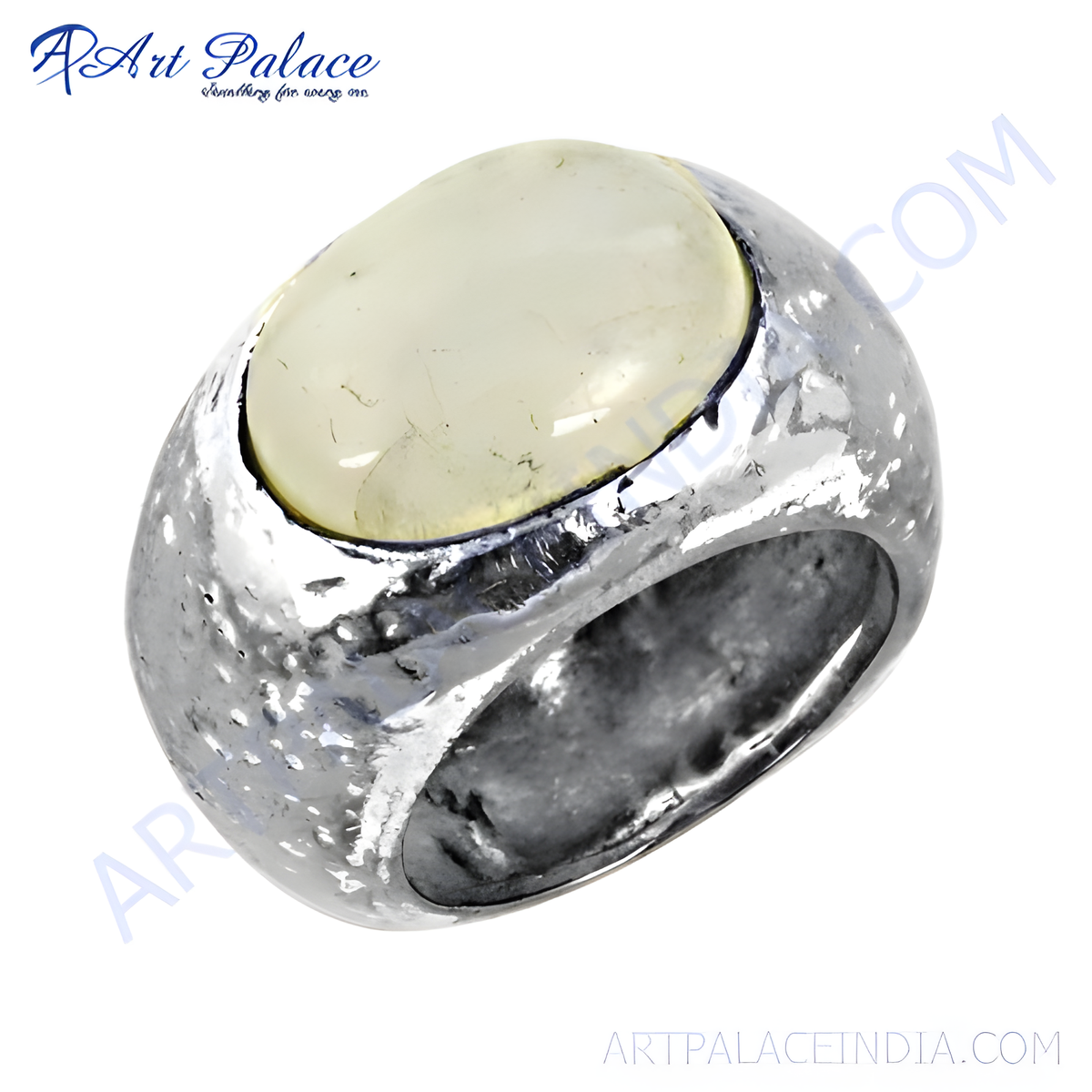 Sterling silver statement ring with a large, oval, cream colored cabochon gemstone