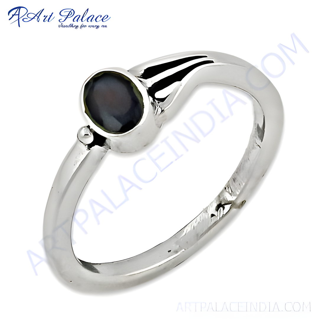 Sterling silver ring with a black gemstone center, modern design, for women.