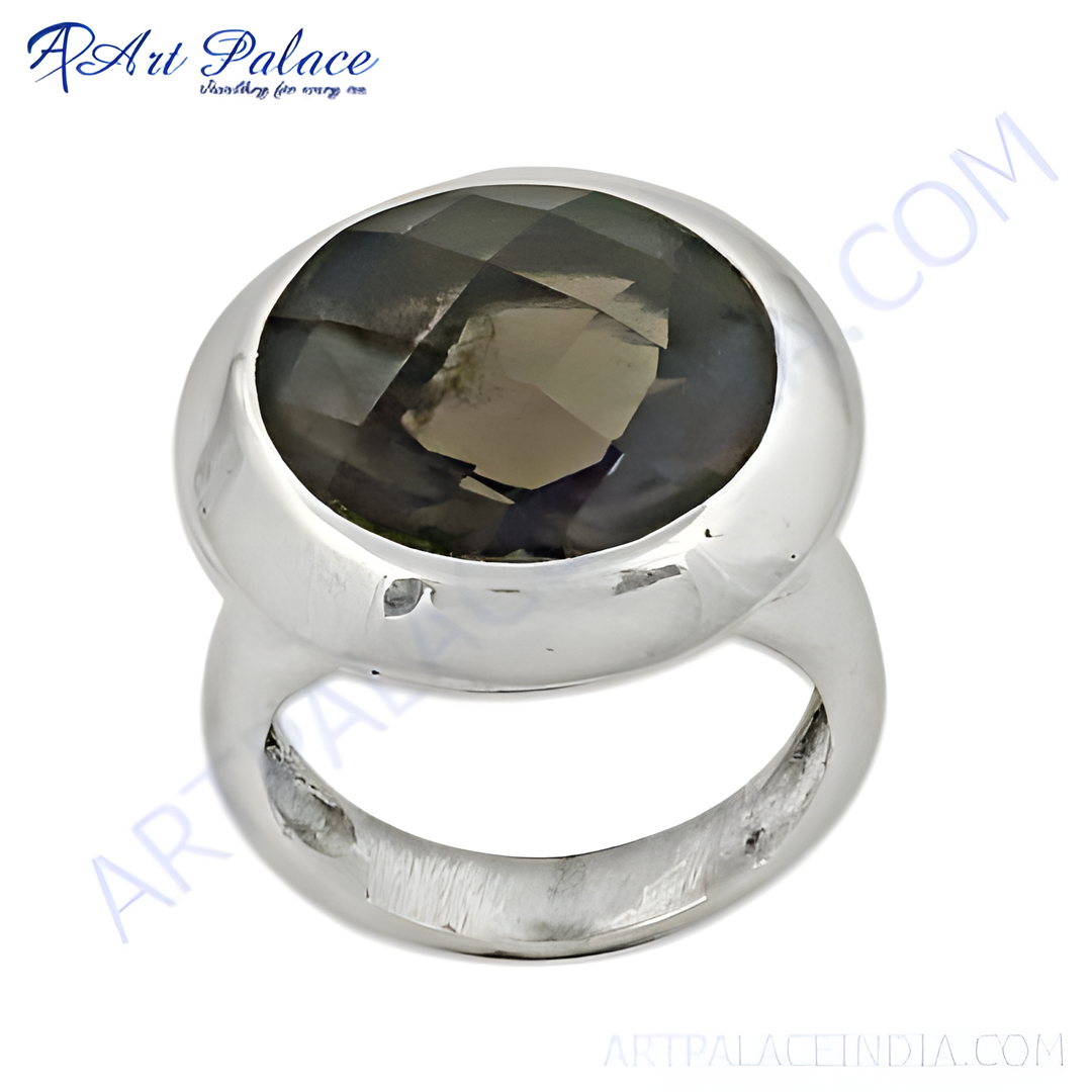 Sterling silver cocktail ring with a large oval-cut smoky quartz gemstone.