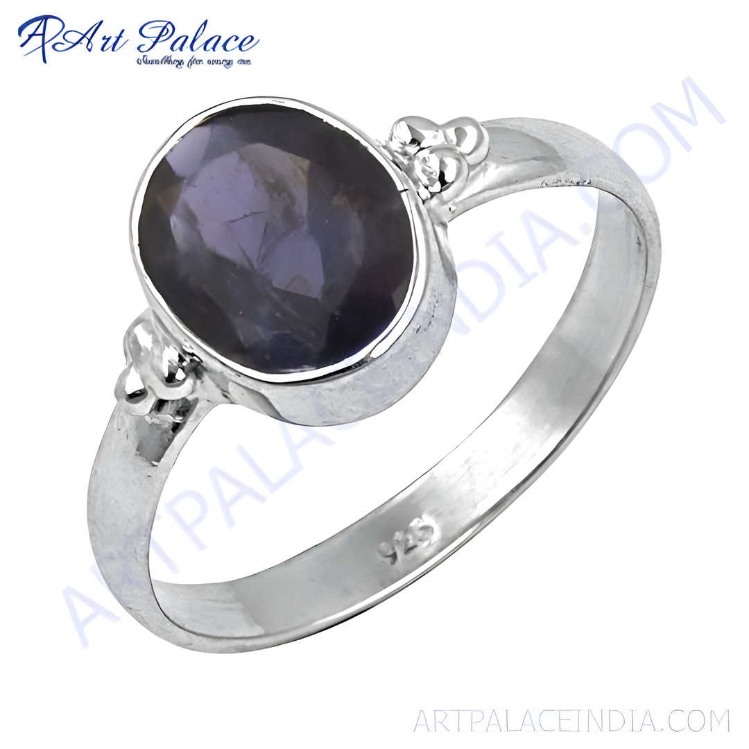 925 sterling silver iolite ring with an oval-cut deep purple gemstone, a beautiful piece of jewelry.