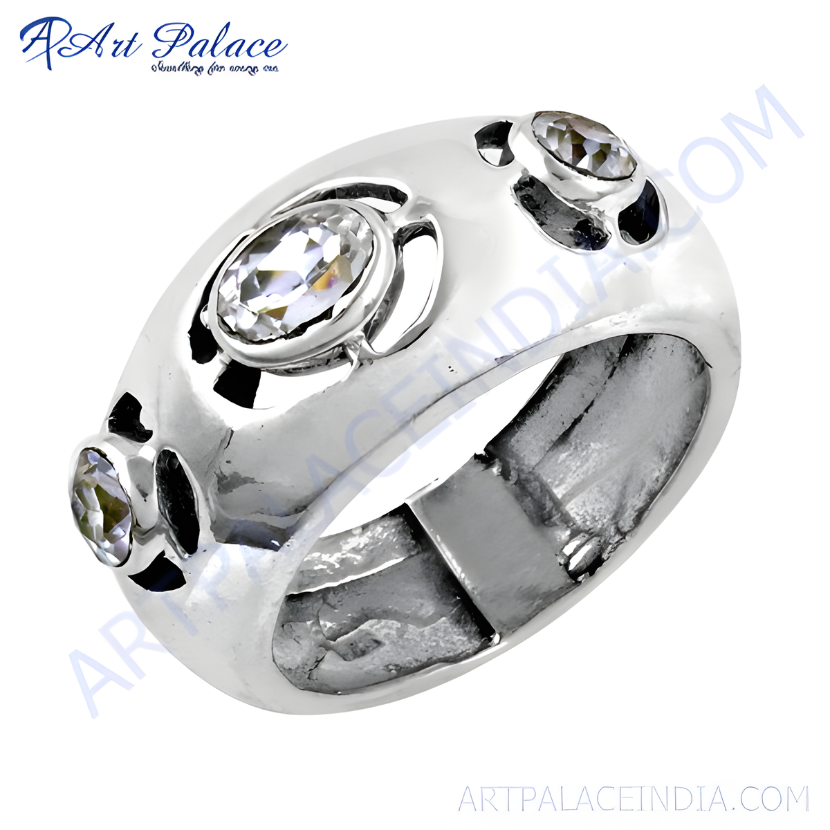 Sterling silver ring featuring a central oval cubic zirconia and smaller round stones