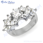 Load image into Gallery viewer, Silver ring with round and princess-cut cubic zirconia stones on a white background.
