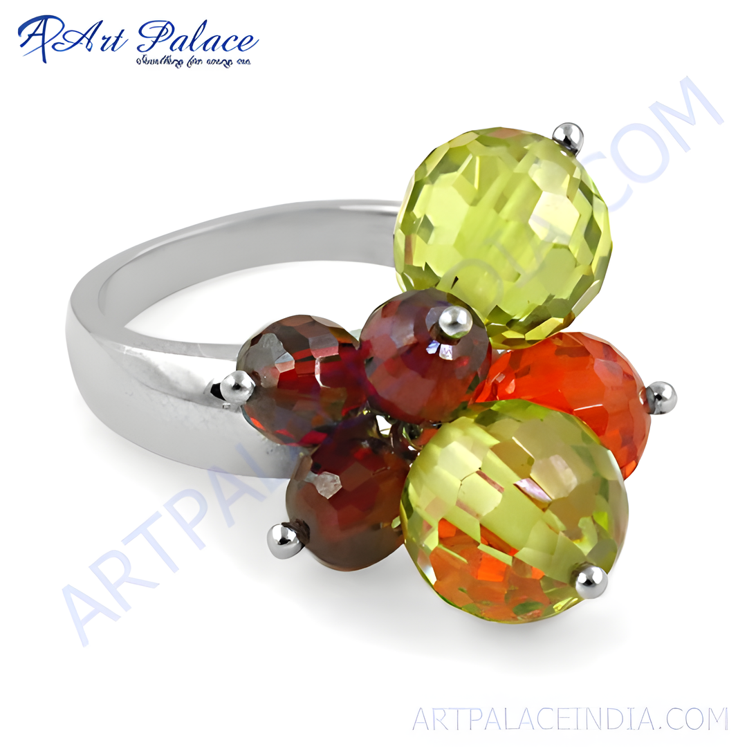 Sterling silver cocktail ring with a cluster of vibrant gemstones in green, orange, and red colors.