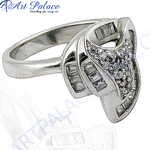 Load image into Gallery viewer, Close-up of a silver ring with baguette-cut diamonds on a white background.
