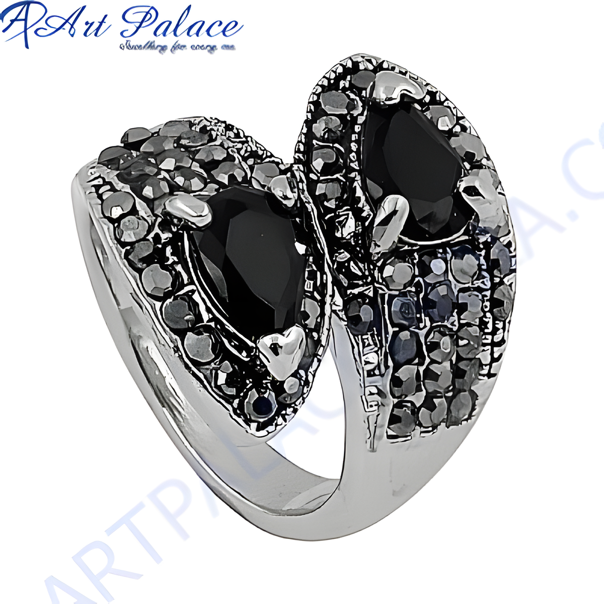 925 sterling silver ring with two black pear shaped stones, a striking statement piece