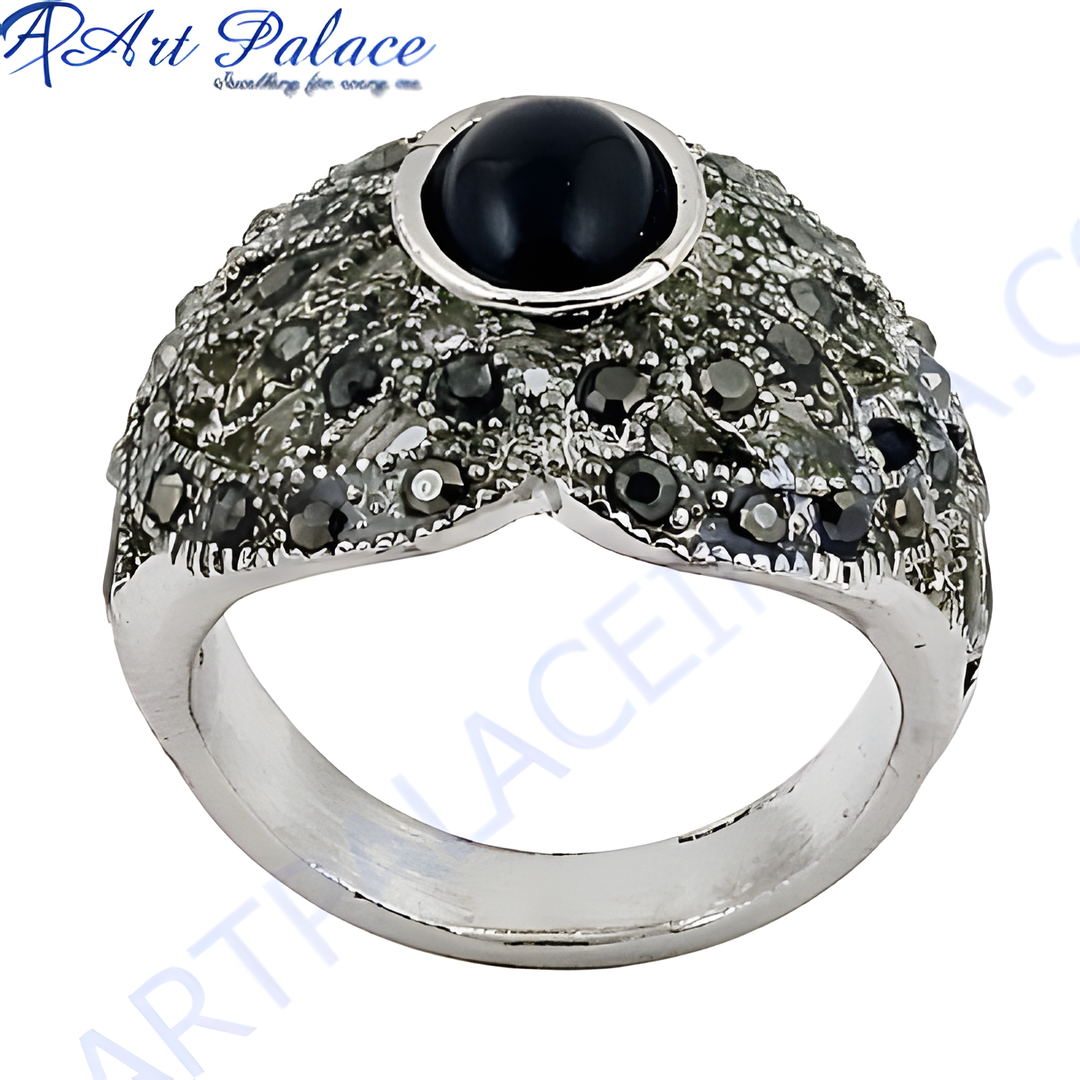 Sterling silver ring with a large black gemstone center and sparkling accents for women.