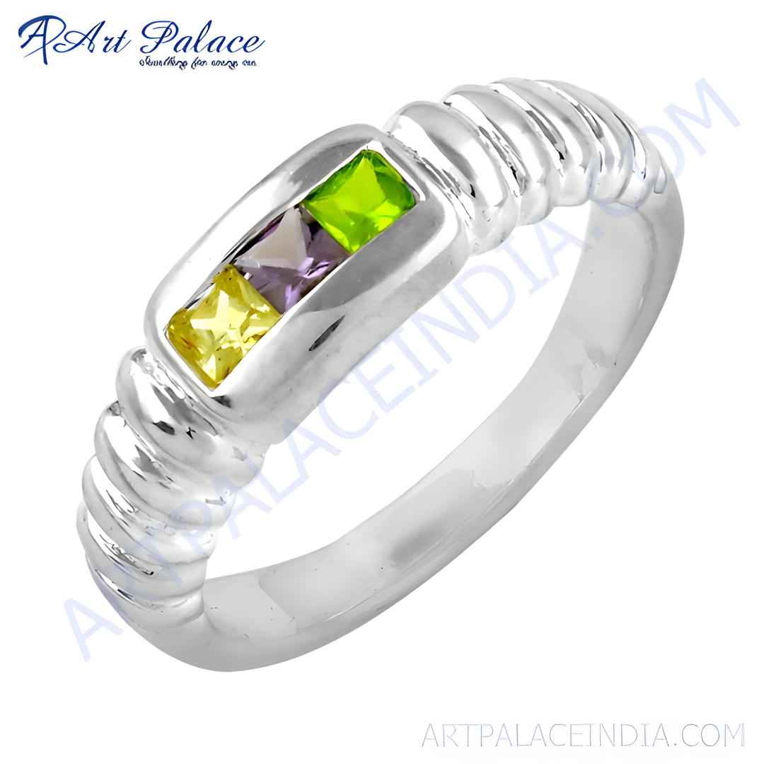 Sterling silver ring featuring square-cut yellow, purple and green gemstones.