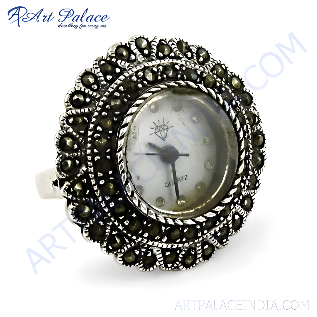 Sterling silver watch ring with marcasite stones surrounding a quartz watch face, a unique and elegant piece of jewelry.