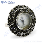 Load image into Gallery viewer, Sterling silver watch ring with marcasite stones surrounding a quartz watch face, a unique and elegant piece of jewelry.
