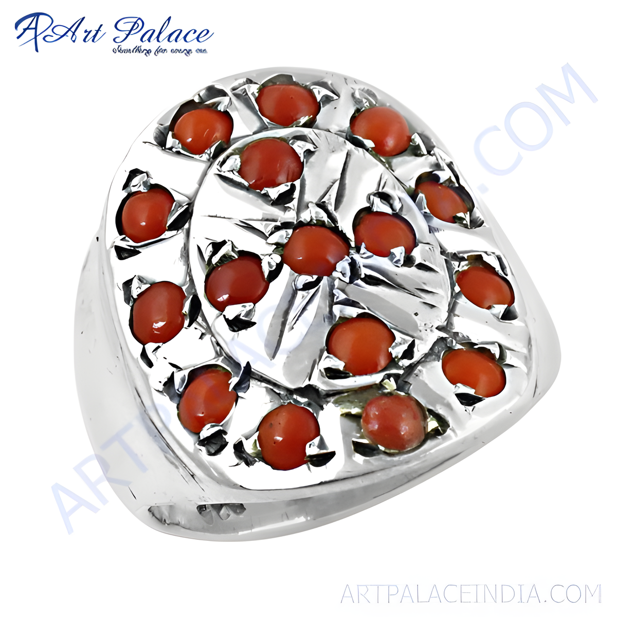 Sterling silver ring with a cluster of bright red coral gemstones in a unique setting