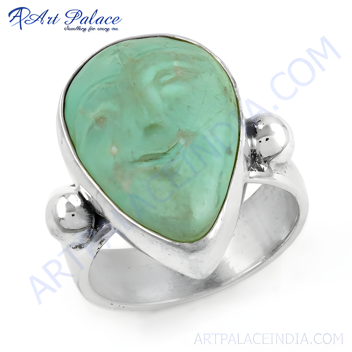 Sterling silver ring with a large turquoise gemstone, teardrop shape, and silver accents
