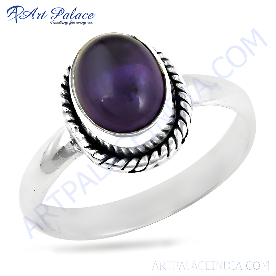Sterling silver amethyst ring with a large oval purple gemstone.