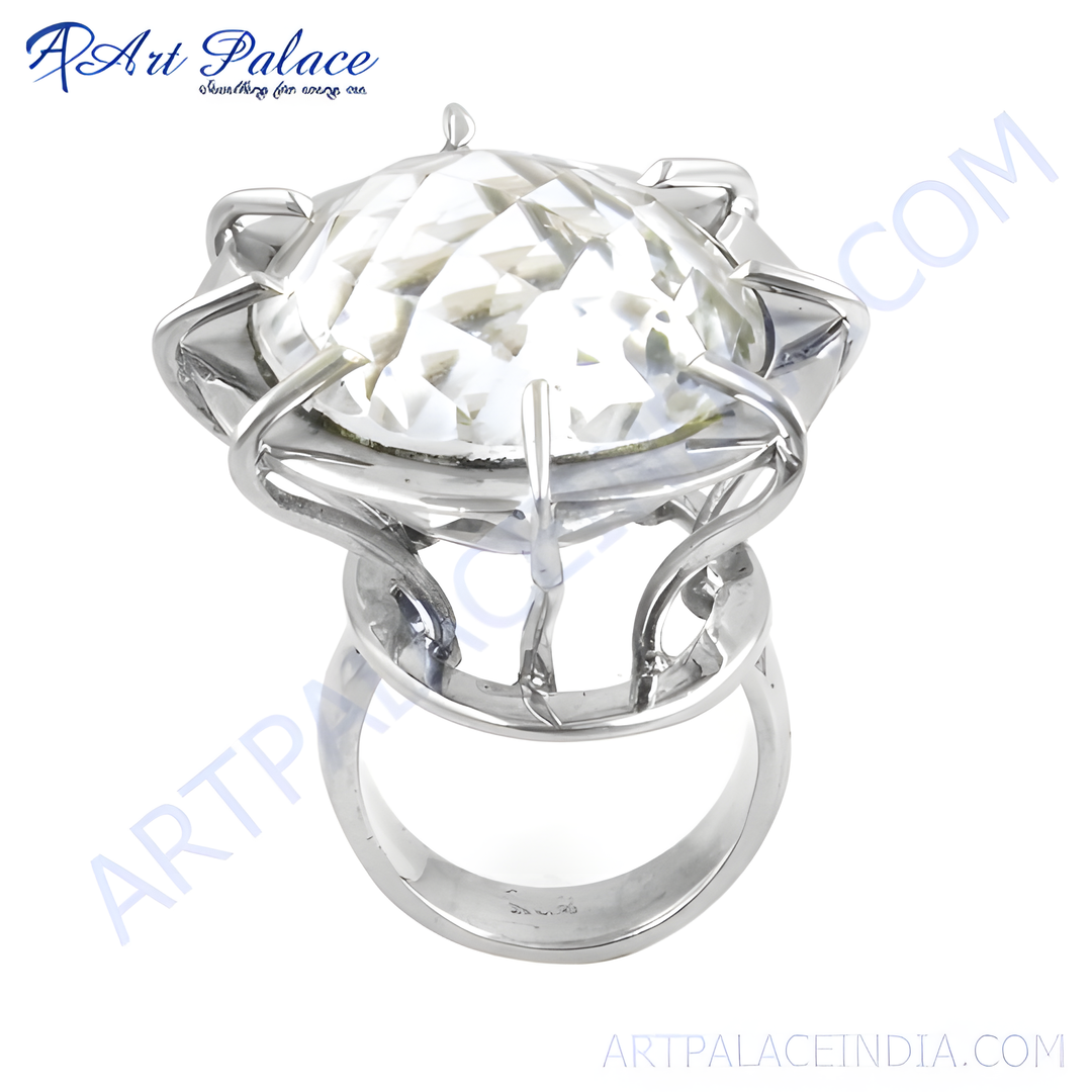 Silver statement ring with large, sparkling cubic zirconia gemstone on a white background.