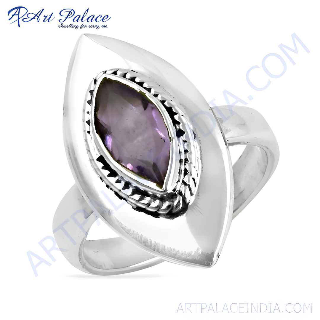 Sterling silver ring with a marquise-shaped amethyst gemstone in a statement design, purple color
