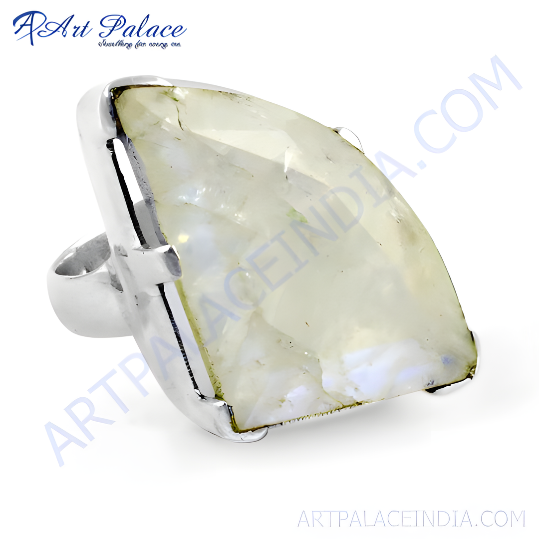 Sterling silver moonstone ring with a large, translucent gemstone in a unique setting.
