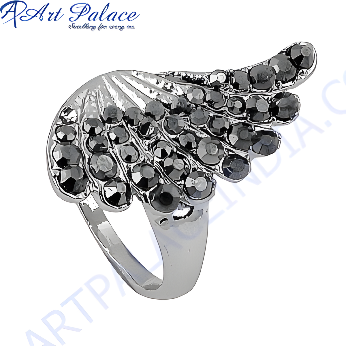 Silver wing ring with a black gemstone design, perfect for a bold fashion statement