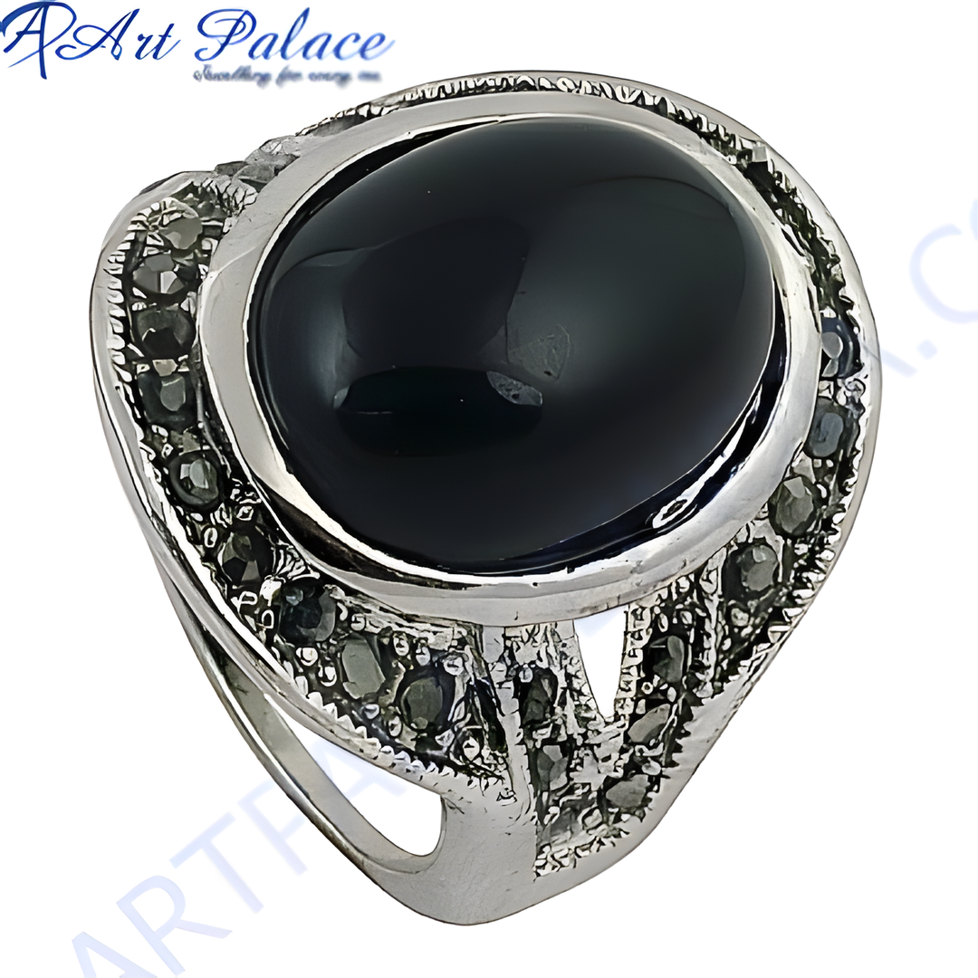 925 sterling silver cocktail ring with a large oval black onyx gemstone and marcasite accents
