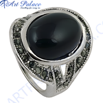 Load image into Gallery viewer, 925 sterling silver cocktail ring with a large oval black onyx gemstone and marcasite accents
