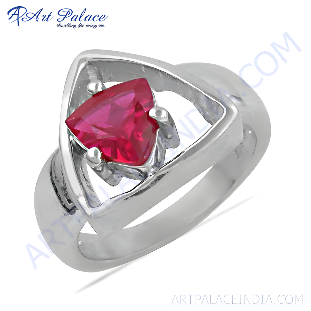 925 sterling silver ring with a vibrant red triangle-cut ruby gemstone. A stunning fashion piece.