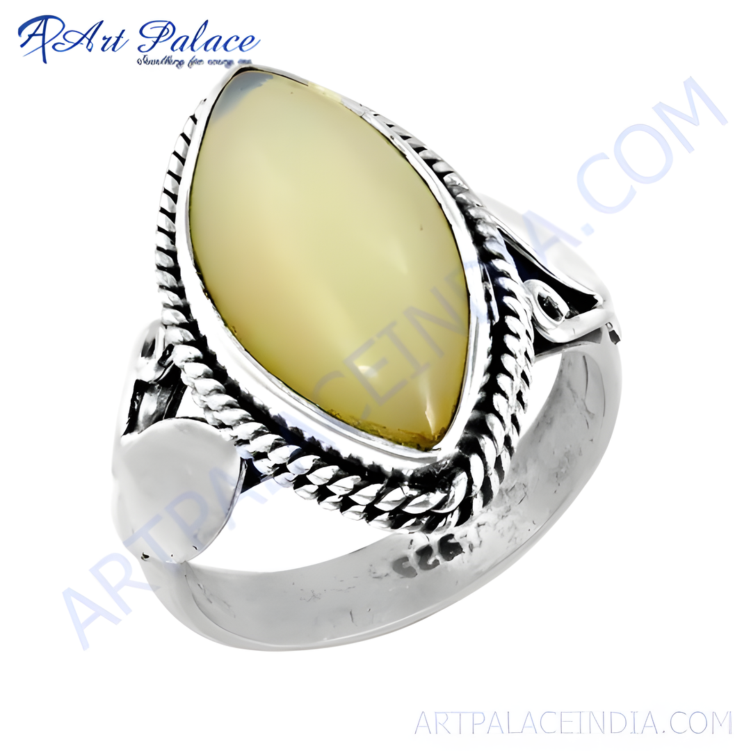 925 sterling silver statement ring with a large oval cream colored gemstone.