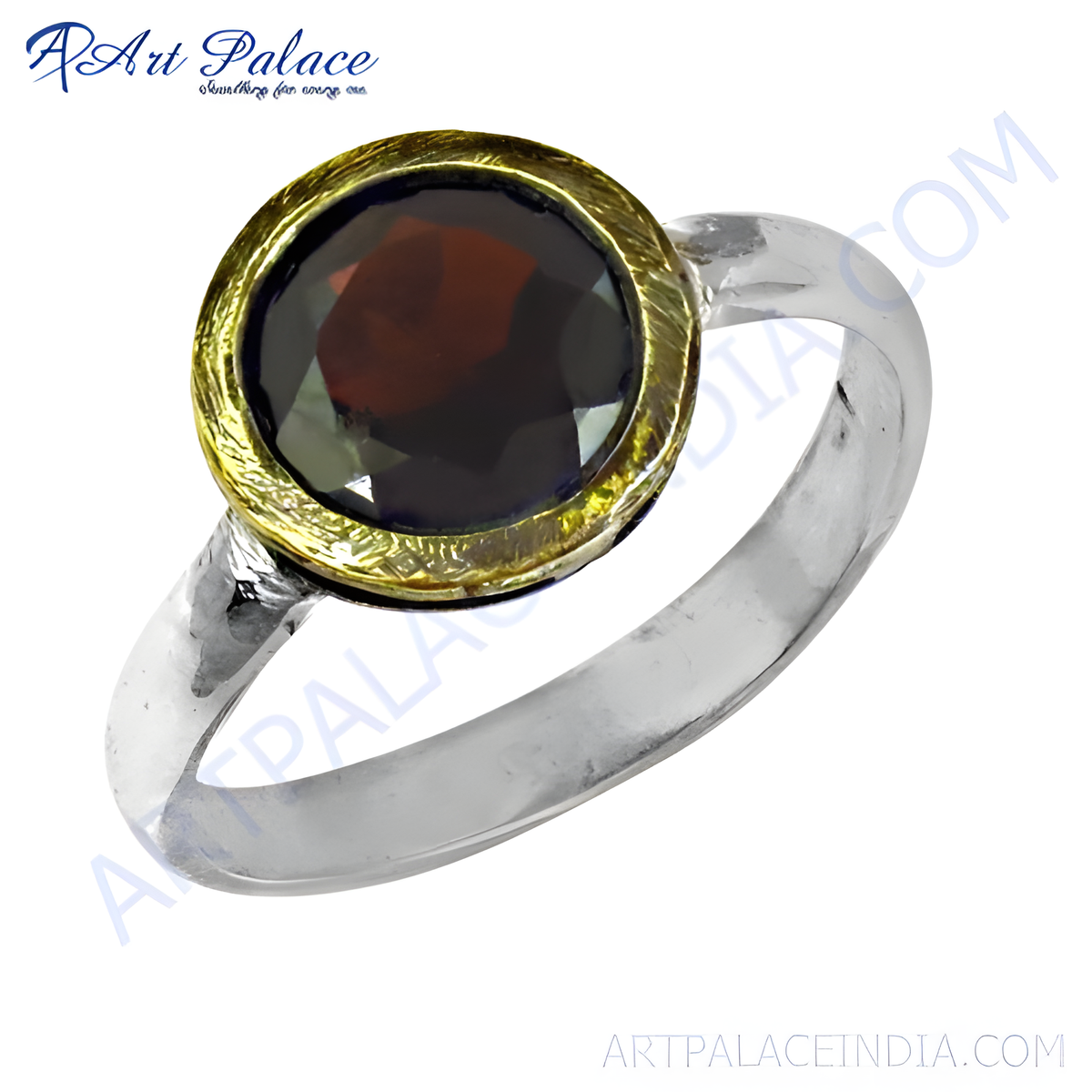 A round red garnet gemstone ring with a gold plating finished bezel setting and a silver band