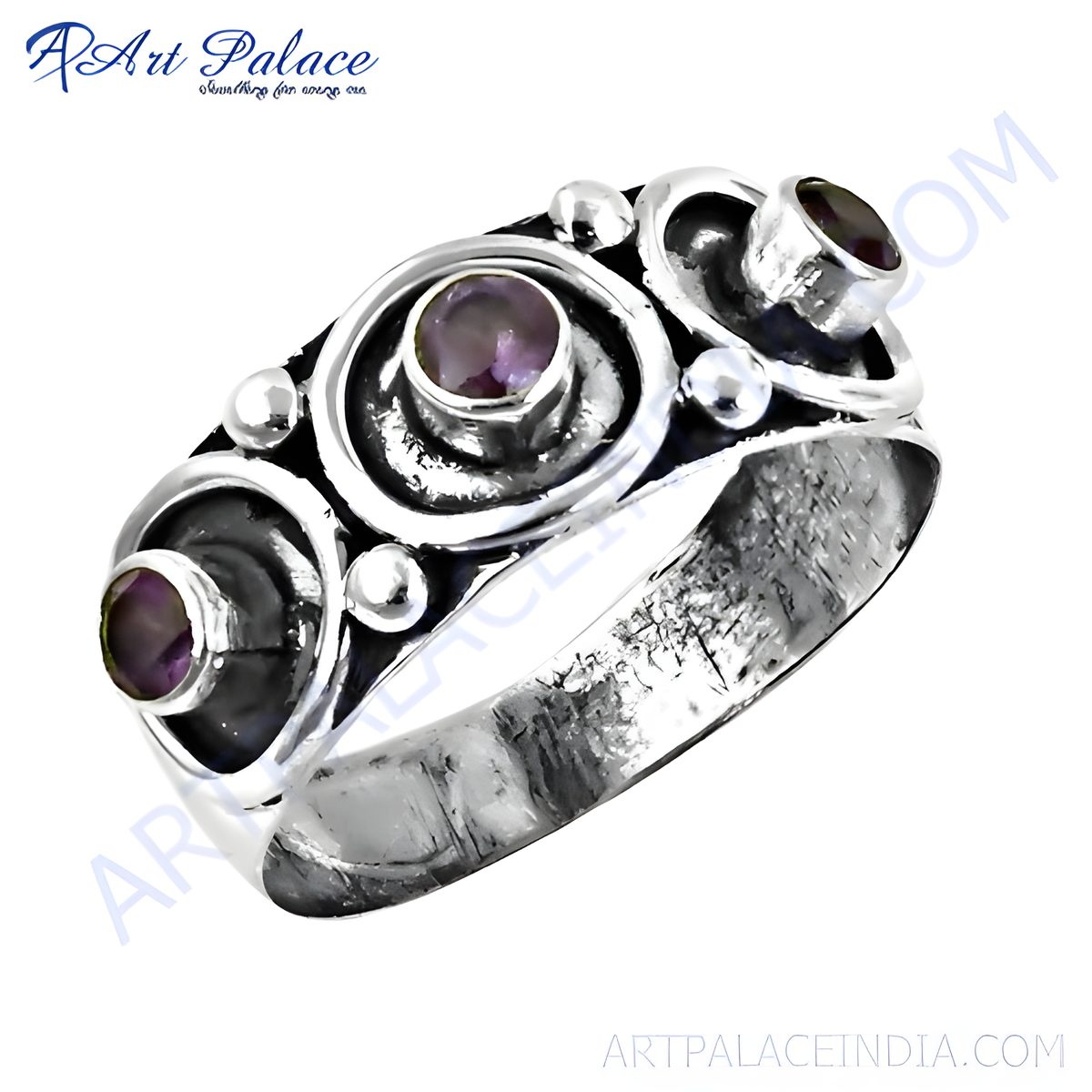 Sterling silver ring with three oval amethyst stones, set in a unique design