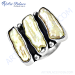Load image into Gallery viewer, Sterling silver ring featuring three elongated pearl gemstones on a white background.
