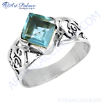 Load image into Gallery viewer, Sterling silver ring with a square-cut blue topaz gemstone. Silver band and intricate design.
