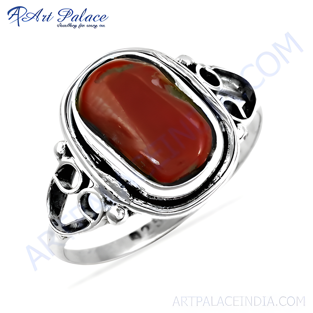 925 sterling silver ring featuring a large oval red jasper gemstone.  Elegant and eye-catching design.