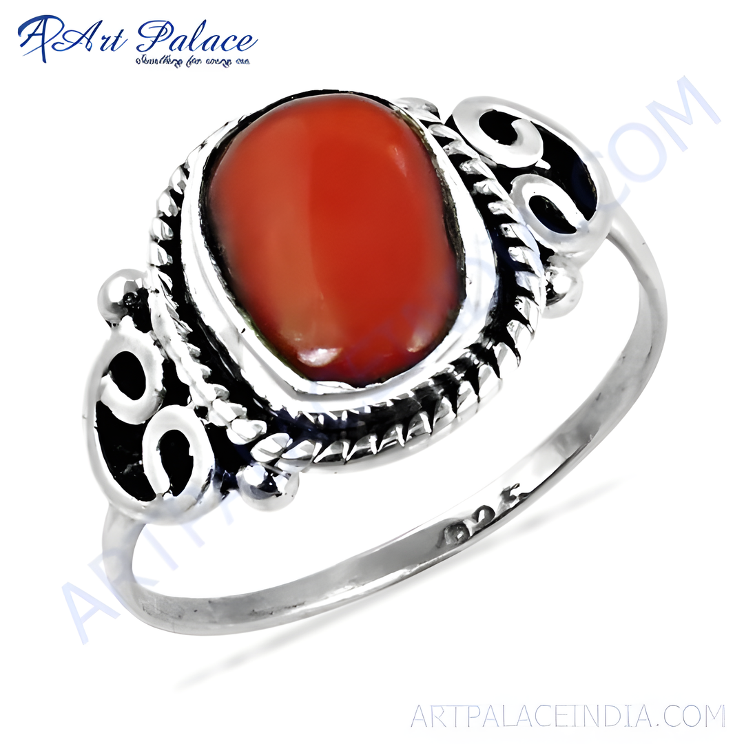 925 sterling silver red coral gemstone ring for women. Oval-shaped red coral set in a silver band.