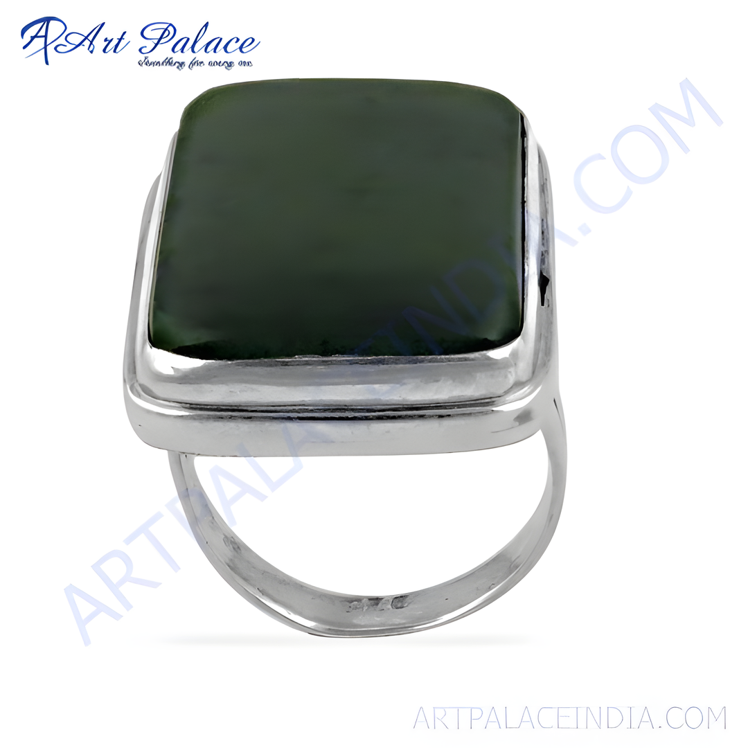 Sterling silver ring featuring a rectangular green gemstone, perfect for women's fashion jewelry.