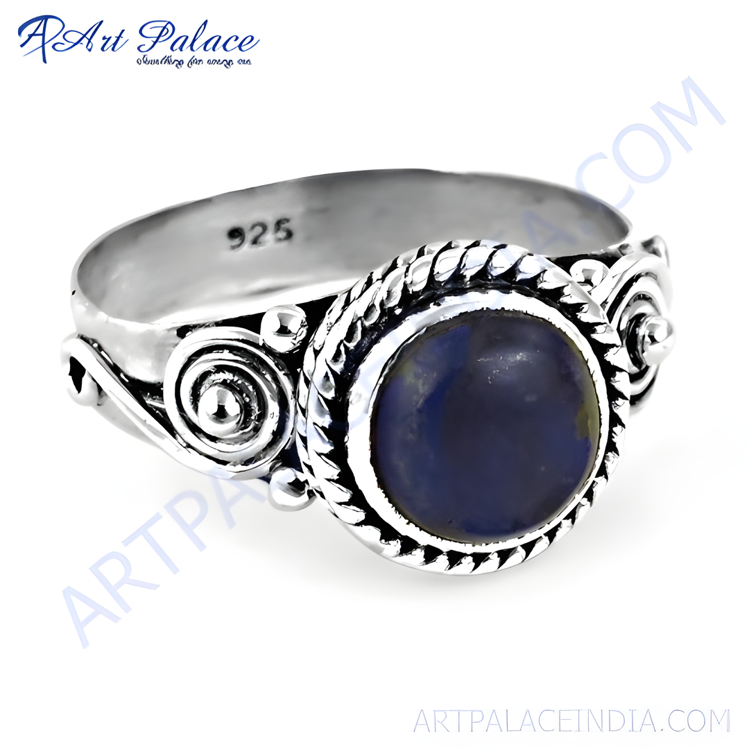 925 sterling silver ring with a round, dark blue lapis lazuli gemstone center.