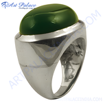 Load image into Gallery viewer, Silver cocktail ring with a large, polished green gemstone. The ring is made of silver and features a modern design.
