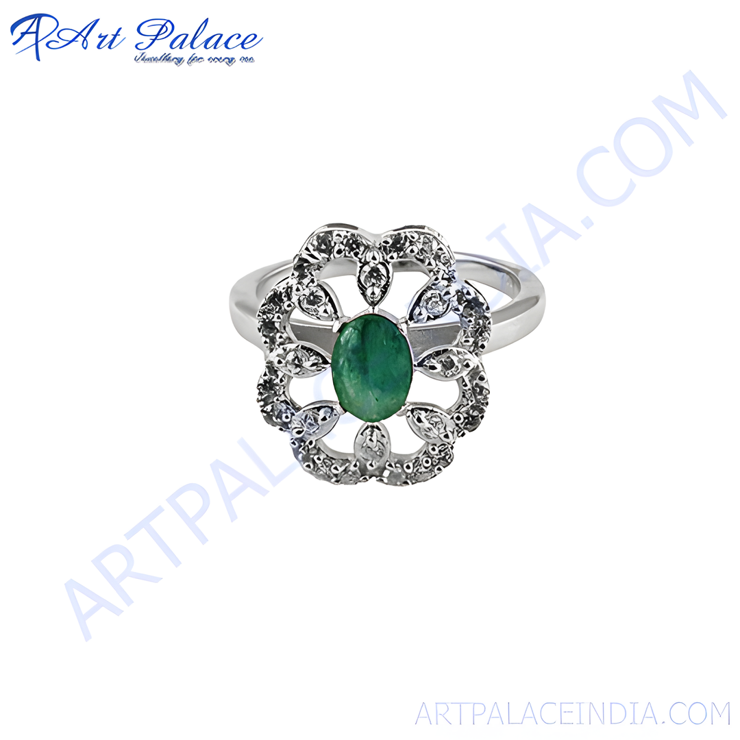 Sterling silver floral ring with a green emerald gemstone center, perfect for women's fashion jewelry.