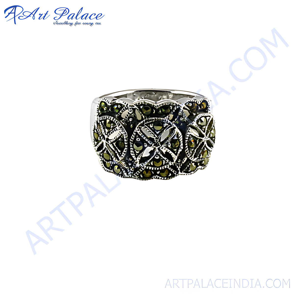Sterling silver cocktail ring with marcasite stones and detailed design