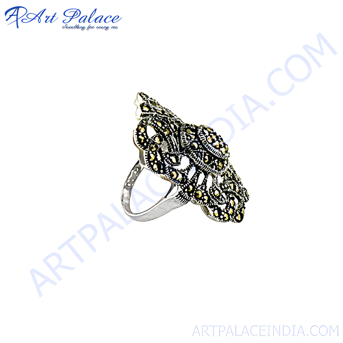 Sterling silver marcasite ring with intricate openwork design and sparkling stones
