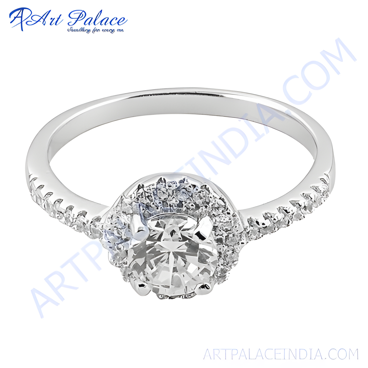 Silver halo engagement ring with a round diamond look center stone and surrounding smaller stones
