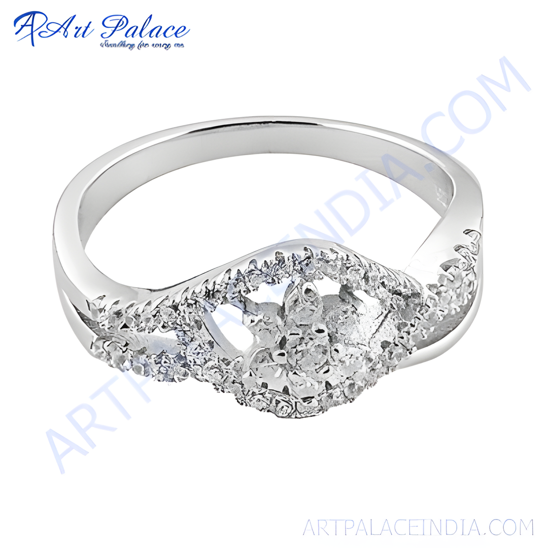 Silver diamond ring with a dazzling diamond center stone and intricate details, a perfect engagement ring.