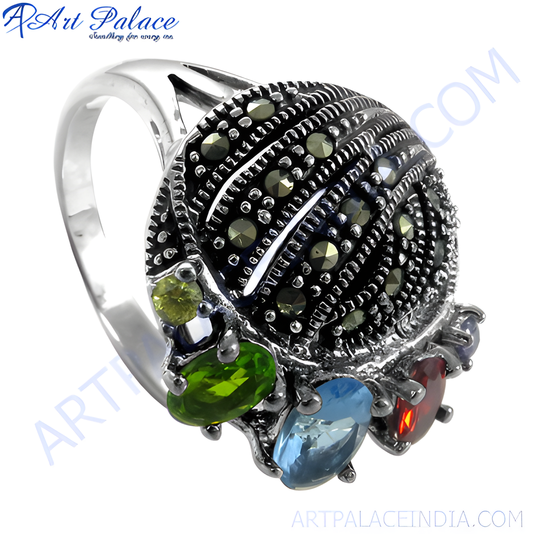 Sterling silver gemstone marcasite ring with green, blue and red gemstones.