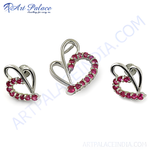 Load image into Gallery viewer, Sterling silver heart shaped jewelry set with ruby gemstones, a pendant and earrings.
